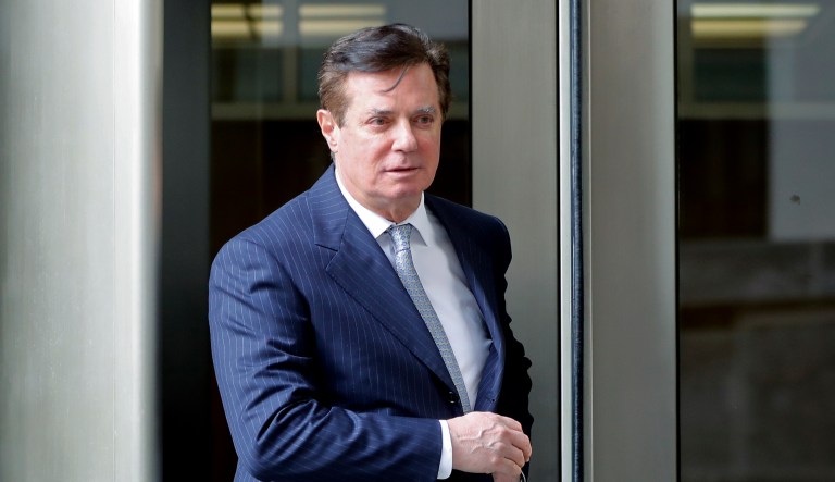 Paul Manafort, President Donald Trump's former campaign chairman, leaves the federal courthouse in Washington, Wednesday, Feb. 14, 2018, in Washington.