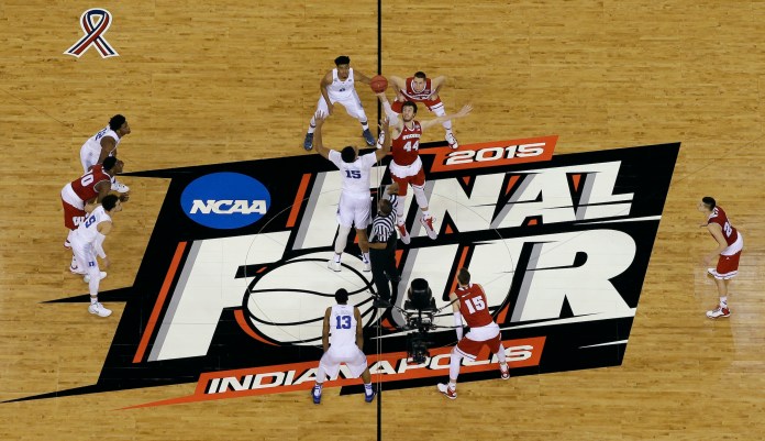Villanova players celebrate with the trophy after beating Michigan 79-62 in the championship game of the Final Four NCAA college basketball tournament, Monday, April 2, 2018, in San Antonio.