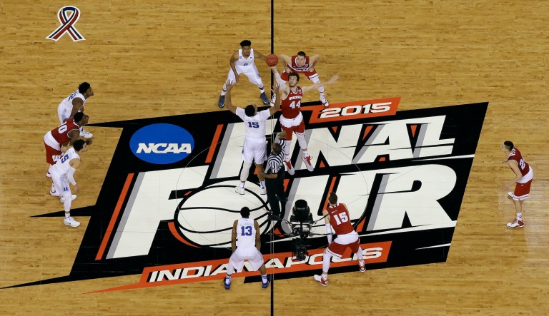 Villanova players celebrate with the trophy after beating Michigan 79-62 in the championship game of the Final Four NCAA college basketball tournament, Monday, April 2, 2018, in San Antonio.