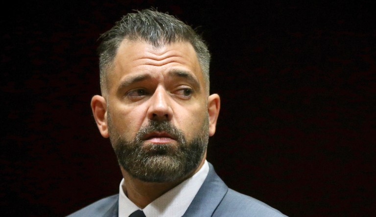 In this May 28, 2019 file photo, Mark D'Amico stands before pleading not guilty during his arraignment to charges including theft by deception at Burlington County Superior Court in Mount Holly, N.J. 
D'Amico is facing federal charges of conspiracy to commit wire fraud and money laundering. (Tim Tai/The Philadelphia Inquirer via AP, Pool, File)