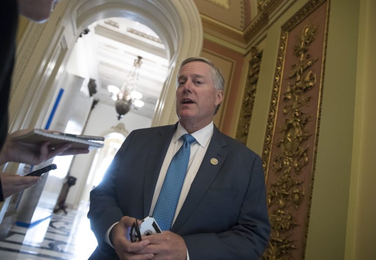 Rep. Mark Meadows, R-N.C., chairman of the conservative House Freedom Caucus, speaks with reporters as the House prepared to vote on relief for hurricane victims at the Capitol in Washington, Friday, Sept. 8, 2017.