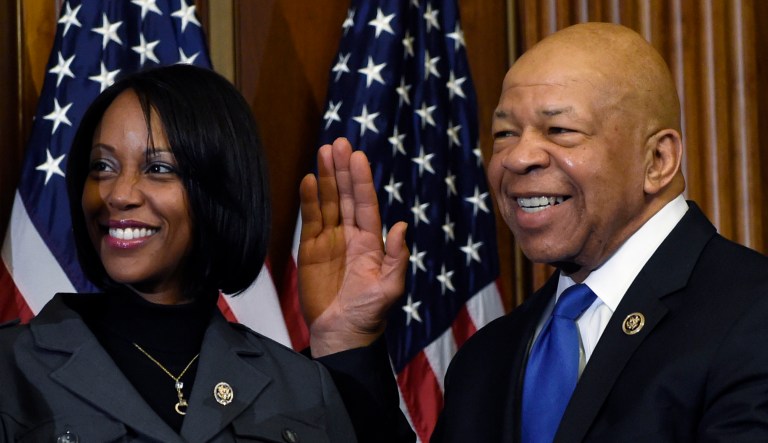 House Speaker John Boehner of Ohio poses for a photo with Rep. Elijah Cummings, D-Md., right, during a re-enactment the House oath-of-office, Tuesday, Jan. 6, 2015, on Capitol Hill in Washington. Cummings' wife Maya Rockeymoore is at center.