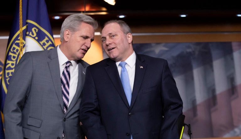 In this Tuesday, Dec. 12, 2017, photo, House Majority Leader Kevin McCarthy speaks with House Majority Whip Steve Scalise during a news conference on the tax bill on Capitol Hill in Washington.