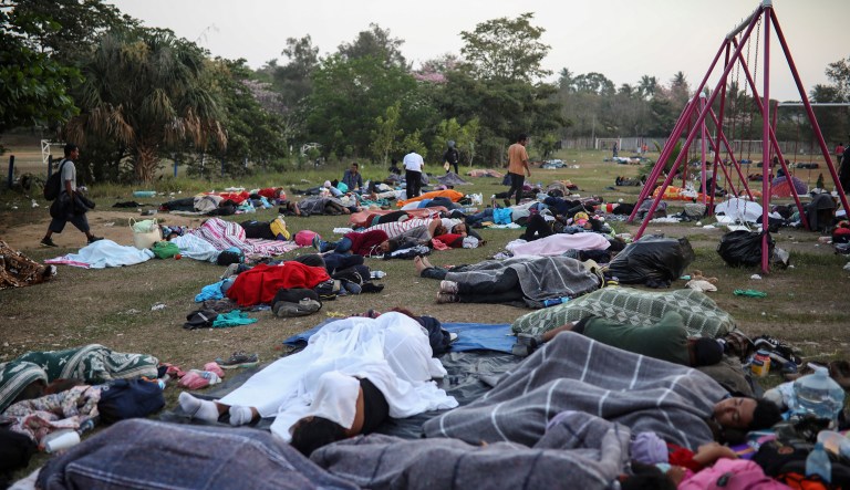 Dozens of Central American migrants traveling with the annual "Stations of the Cross" caravan, sleep at a sports club in Matias Romero, Oaxaca State, Mexico, Tuesday, April 3, 2018. The caravan of Central American migrants that angered U.S. President Donald Trump was sidelined at a sports field in southern Mexico with no means of reaching the border even as Trump tweeted another threat to Mexico Tuesday.