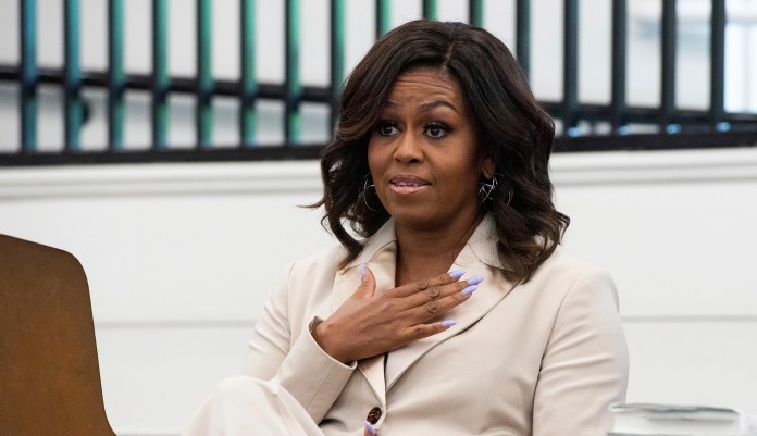 Michelle Obama speaks with students of Morehouse College and Spelman College during a campus visit to Spelman College on Saturday, May 11, 2019, in Atlanta.