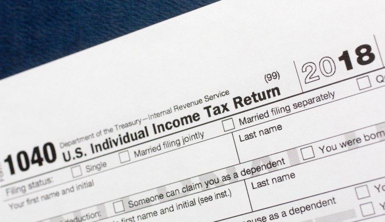 This July 24, 2018, file photo shows a portion of the 1040 U.S. Individual Income Tax Return form for 2018 in New York.
