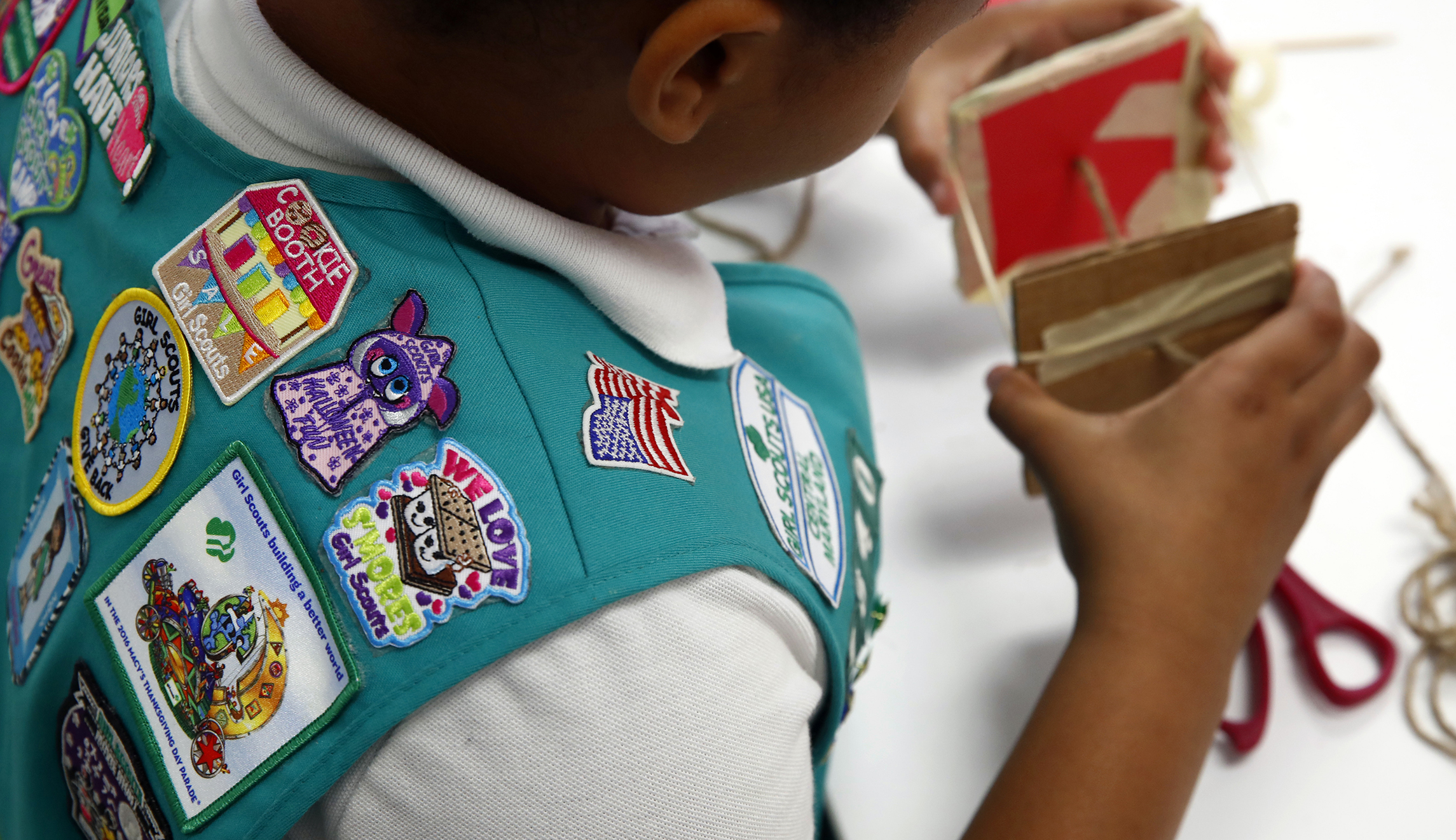 Girl Scouts introduce new badges, but many girls will still join Boy Scouts instead