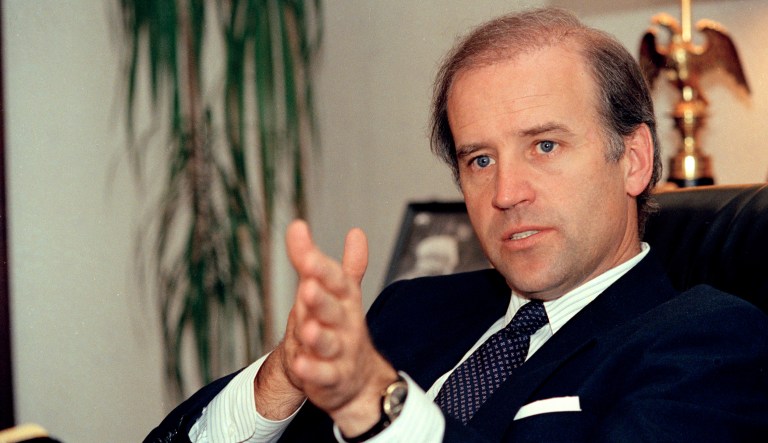 A younger Joe Biden circa 1987 serving in the Senate and sporting darker, if thinner, locks.
