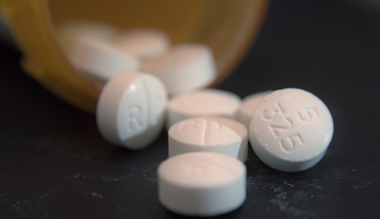 This Tuesday, Aug. 15, 2017 photo shows an arrangement of pills of the opioid oxycodone-acetaminophen in New York.