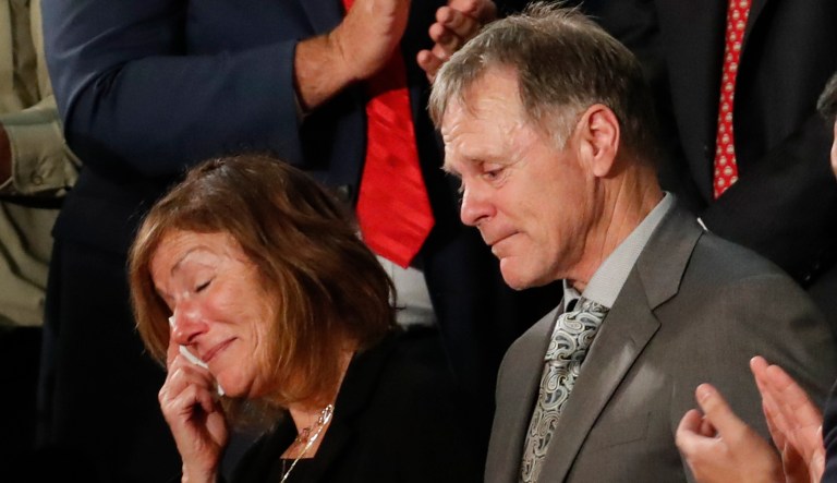 The teary-eyed parents of Otto Warmbier, the American student who died days after being freed from imprisonment in North Korea, react to a standing ovation during State of the Union address to a joint session of Congress on Capitol Hill in Washington, Tuesday, Jan. 30, 2018. 