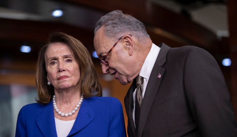 House Minority Leader Nancy Pelosi, D-Calif., left, and Senate Minority Leader Chuck Schumer, D-N.Y., confer as they call for action from President Donald Trump to lower the prices of prescription drugs, during a news conference at the Capitol in Washington, Thursday, May 10, 2018. Trump is poised to give his first speech on lowering drug prices Friday.
