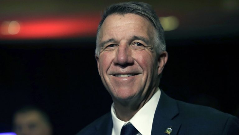 Republican Vermont Gov. Phil Scott smiles after voting in Berlin, Vt., Tuesday, Nov. 6, 2018.