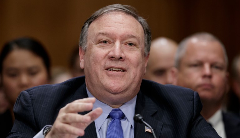 Secretary of State Mike Pompeo appears before the Senate Foreign Relations Committee as lawmakers demanded specifics from him on President Donald Trump's meeting with Russian leader Vladimir Putin in Helsinki last week, on Capitol Hill in Washington, Wednesday, July 25, 2018. Pompeo says he has personally told top Russian officials that there will be "severe consequences" for any interference in U.S. elections or the American democratic process.