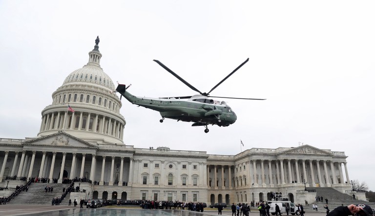 A military helicopter carries former president Barack Obama and Michelle Obama from the Capitol in Washington, Friday, Jan. 20, 2017, en route to Andrews Air Force Base, Md. during the inauguration ceremony Donald Trump.