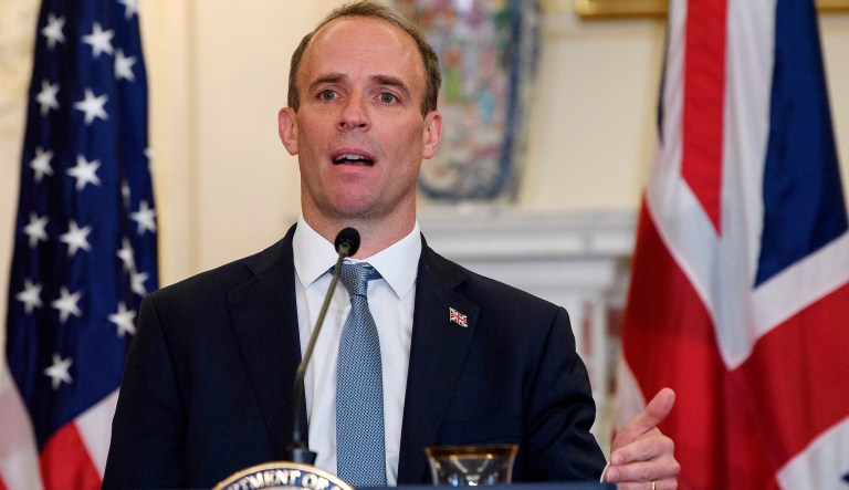 British lawmaker Dominic Raab, Secretary of State for Foreign and Commonwealth Affairs walks towards 10 Downing Street for a Cabinet meeting ahead of the budget being announced in Parliament in London, Wednesday, March 11, 2020. 
