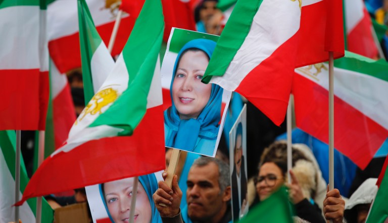 Demonstrators carry posters of Maryam Rajavi, the leader of the National Council of Resistance of Iran, during a protest in Paris, Friday Feb.8, 2019 as Iran marks the 40th anniversary of its Islamic Revolution.