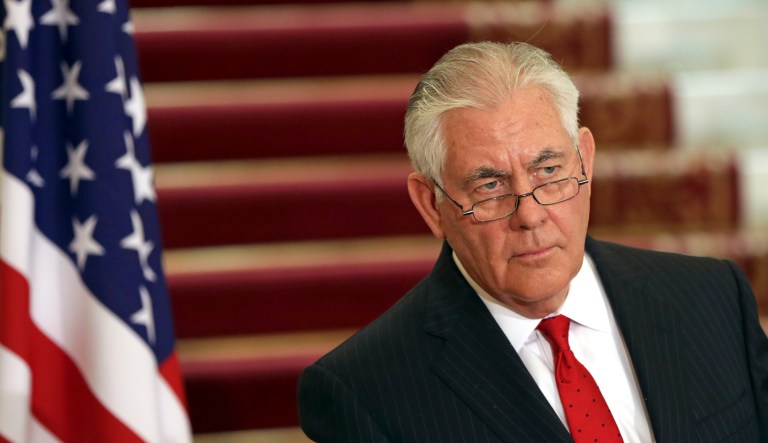 Former Secretary of State Rex Tillerson, left, listens during a press conference in Cairo, Egypt, Monday, Feb. 12, 2018.