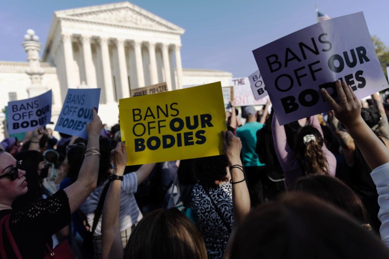 Abortion rights supporters gather in front of the Supreme Court in Washington after a Monday night leak of a draft decision that considered overturning Roe v. Wade.