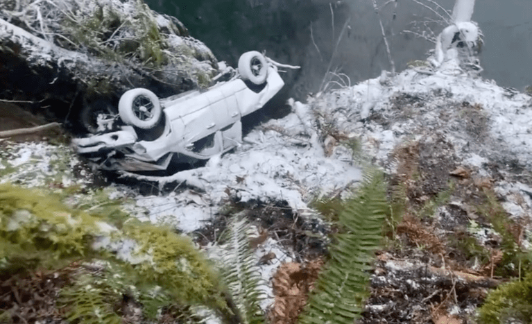 Woman survives truck falling off cliff and into river in Washington state