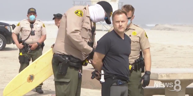 Three arrested on California beach during stay-at-home order protest