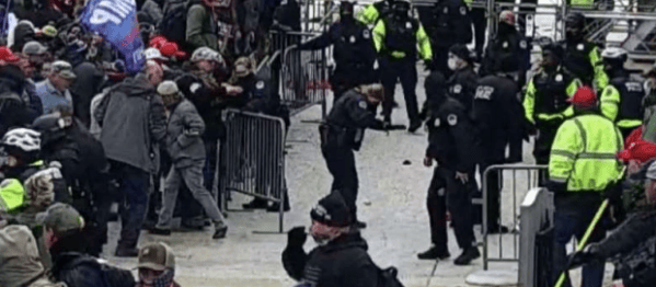 Two men charged with chemical spray assault of officer Brian Sicknick
