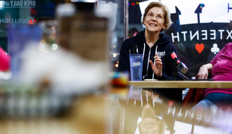 Democratic presidential candidate Sen. Elizabeth Warren, D-Mass., meets with campaign volunteers at Lucky's on 16th, Sunday, Jan. 26, 2020, in Cedar Rapids, Iowa. (AP Photo/Matt Rourke)