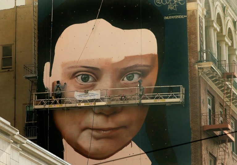 Swedish environmental activist Greta Thunberg attends a climate march, in Turin, Italy, Friday. Dec. 13, 2019. Thunberg was named this week Time's Person of the Year, despite becoming the figurehead of a global youth movement pressing governments for faster action on climate change. in Turin, Italy, Friday, Dec. 13, 2019.