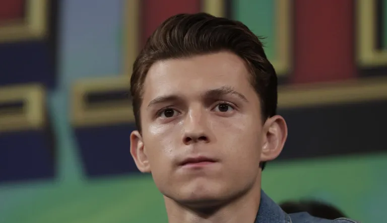 Actor Tom Holland listens to a reporter's question during a press conference for his new movie "Spider-Man: Far From Home" in Seoul, South Korea, Monday, July 1, 2019. The movie is to be released in South Korea on July 2, 2019.