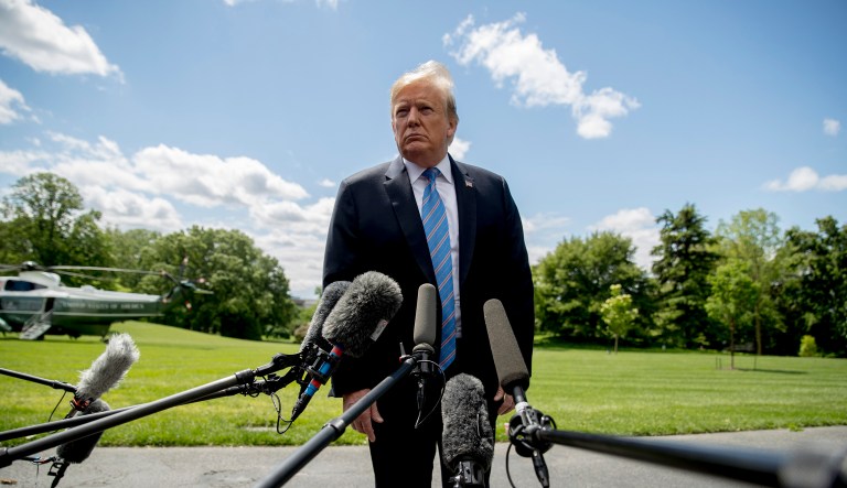 President Donald Trump listens to a question from a member of the media on the South Lawn of the White House in Washington, Tuesday, May 14, 2019, before boarding Marine One for a short trip to Andrews Air Force Base, Md., to travel to Louisiana.