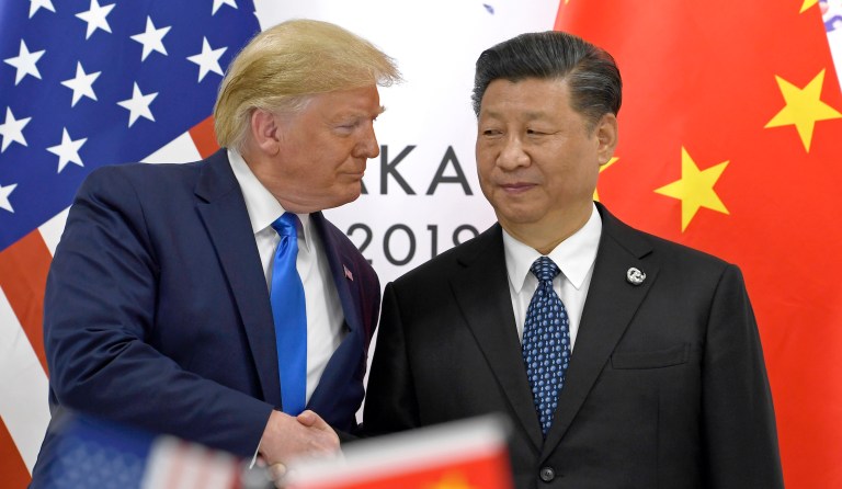 Trump says China trade deal is ‘fully intact’ after Navarro claimed it was ‘over’