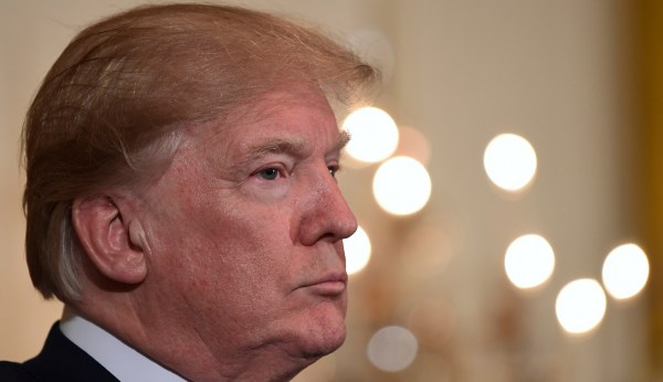 Trump threatens to veto $1.3 trillion spending bill over border wall, DACA