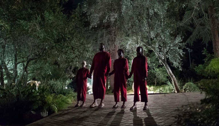 This image released by Universal Pictures shows Evan Alex, from left, Winston Duke, Shahadi Wright Joseph and Lupita Nyong'o in a scene from "Us," written, produced and directed by Jordan Peele.