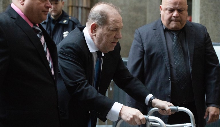 Harvey Weinstein, center, accompanied by attorney Arthur Aidala, right, arrives at court for his rape trial, in New York, Wednesday, Jan. 22, 2020.