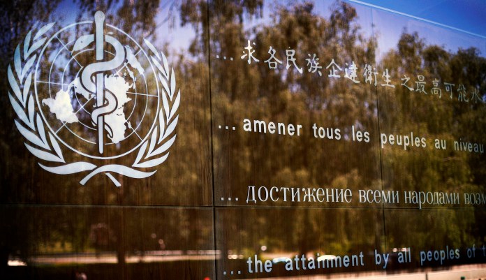 The logo of the World Health Organization is seen at the WHO headquarters in Geneva, Switzerland, Thursday, June 11, 2009. The World Health Organization held an emergency swine flu meeting Thursday and was likely to declare the first flu pandemic in 41 years as infections climbed in the United States, Europe, Australia, South America and elsewhere.