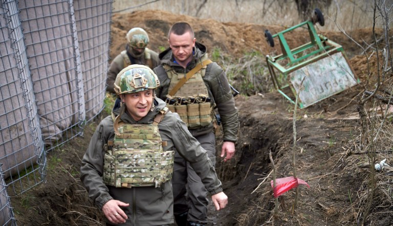 In this Friday, April 9, 2021 file photo, Ukrainian President Volodymyr Zelenskyy visits the war-hit Donbas region, eastern Ukraine. 