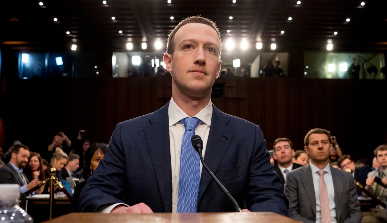 FILE - In this April 10, 2018 file photo, Facebook CEO Mark Zuckerberg arrives to testify before a joint hearing of the Commerce and Judiciary Committees on Capitol Hill in Washington about the use of Facebook data to target American voters in the 2016 election.
