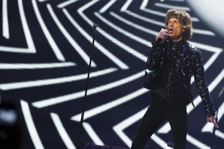   FILE - In this Saturday, Dec. 8, 2012 file photo, singer Mick Jagger of The Rolling Stones performs in concert in New York. On their show Saturday, Dec. 15 at the Prudential Center in Newark, N.J., The Rolling Stones will be joined by Bruce Springsteen, Lady Gaga and the Black Keys. (Photo by Charles Sykes/Invision/AP, File)  