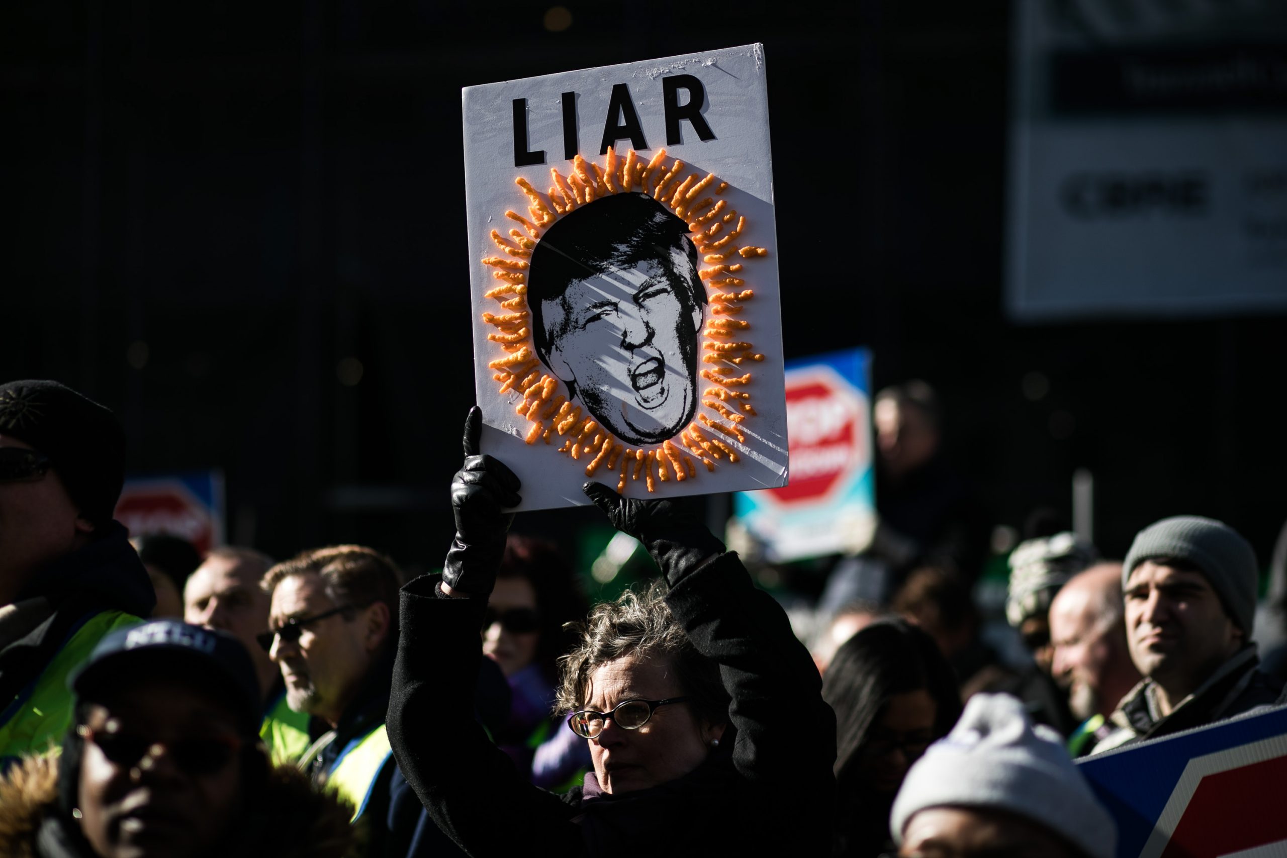 Union members and other federal employees rally to call for an end to the partial government shutdown on Thursday outside the White House. 