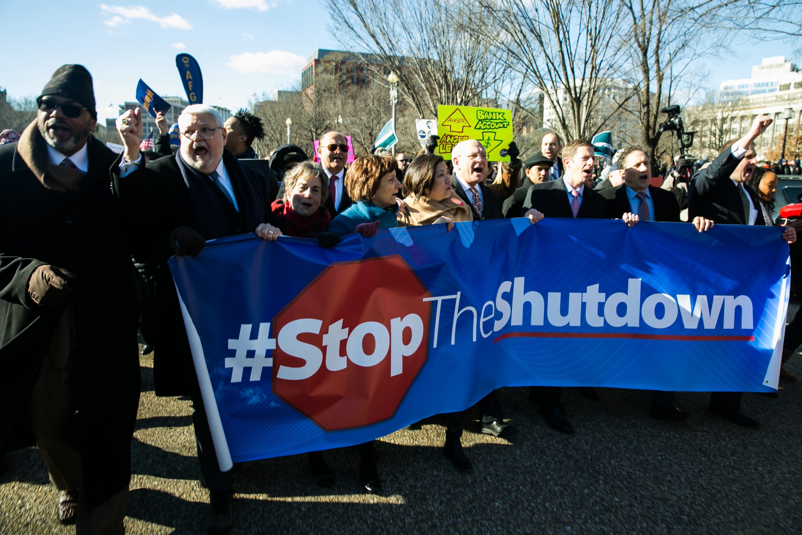 Union members and other federal employees rally to call for an end to the partial government shutdown on Thursday outside the White House. 