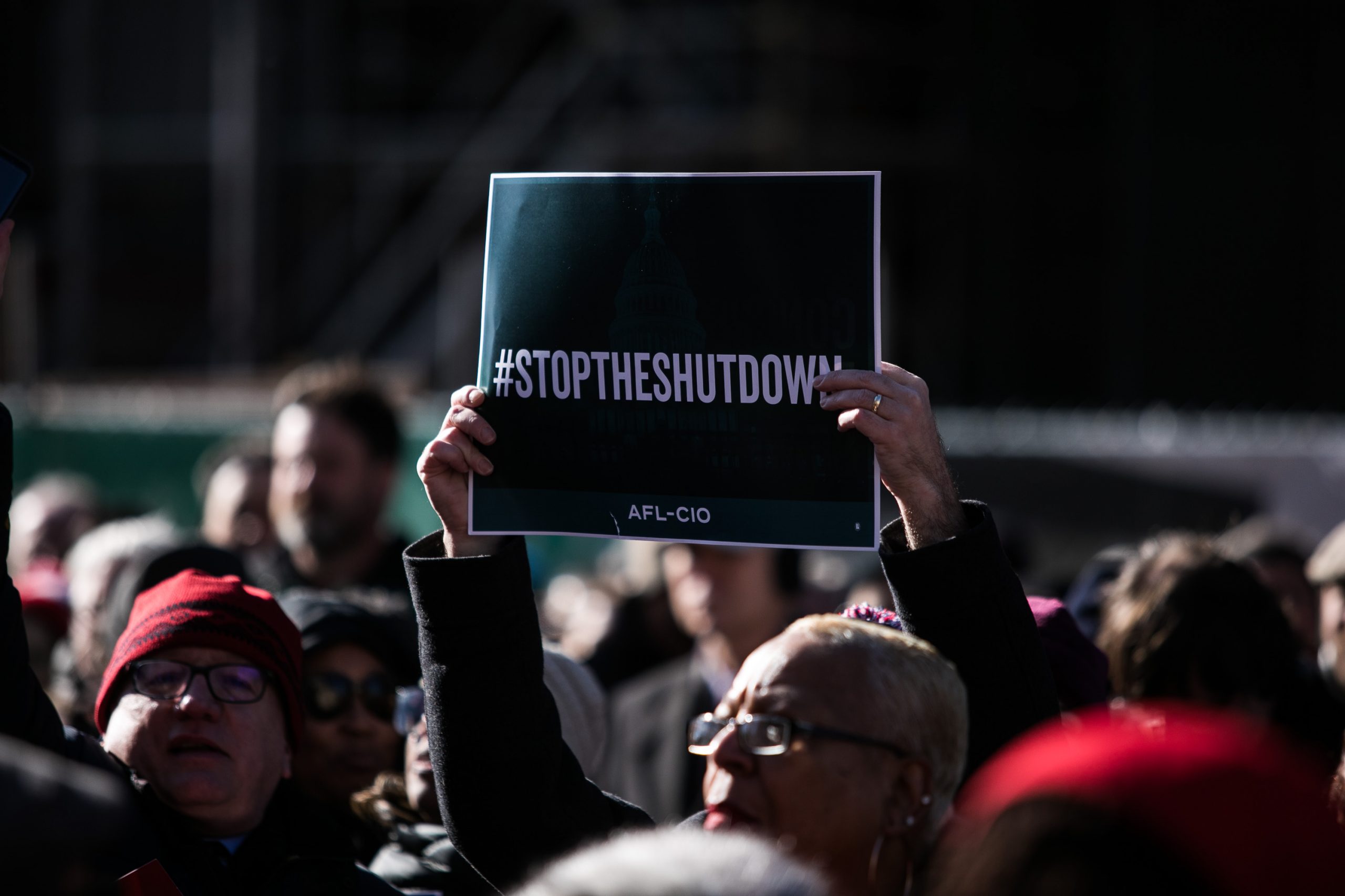 Union members and other federal employees rally to call for an end to the partial government shutdown on Thursday outside the White House. 