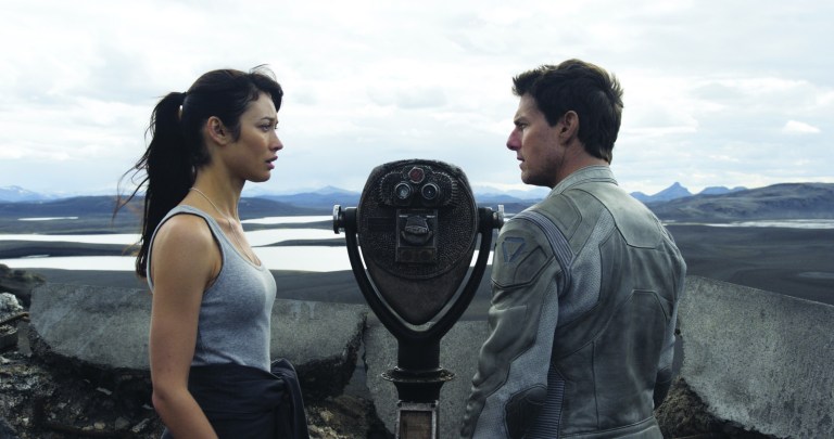 Universal Pictures via AP
Olga Kurylenko and Tom Cruise star in 