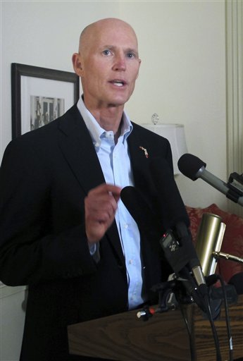 Florida Gov. Rick Scott announced plans Wednesday to expand Medicaid coverage to roughly 900,000 more people under the federal health overhaul, a surprise decision from the vocal critic of President Obama's plan. (Photo: Bill Cotterell, The Tallahassee Democrat/AP)