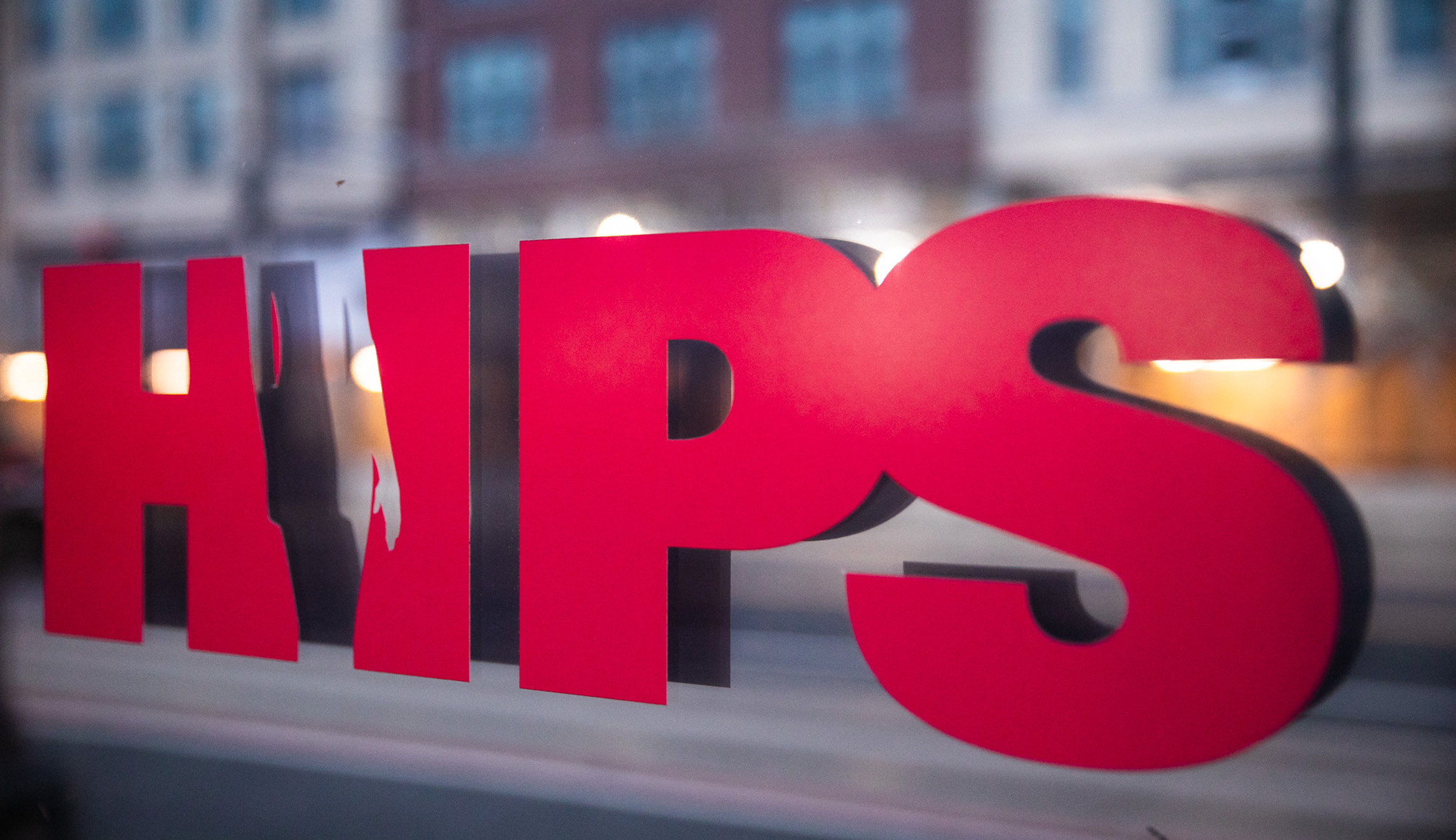 A sign of the HIPS office is seen in Washington, D.C., on Friday. HIPS provides assistance and support to sex workers in the Washington D.C. area.