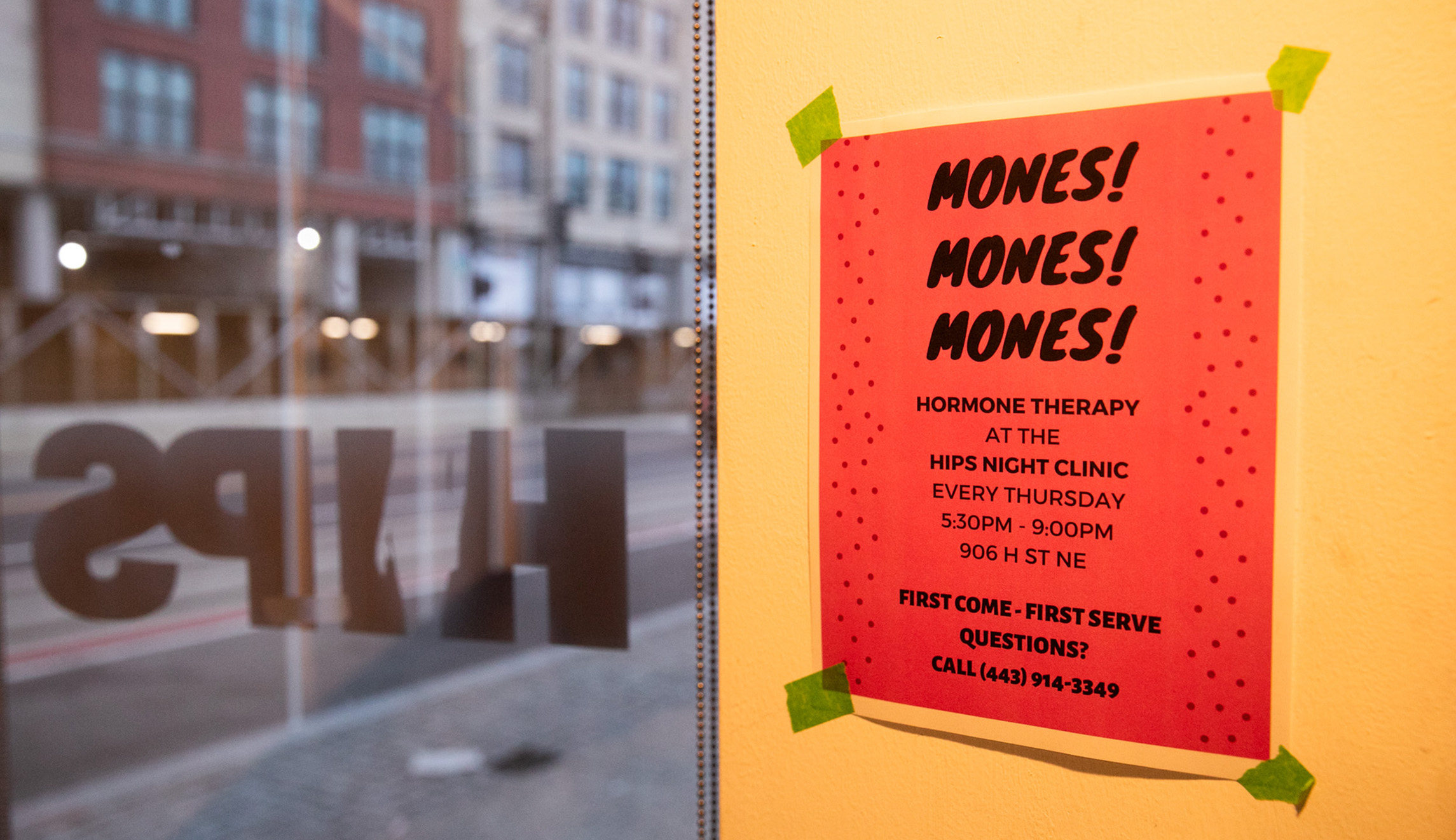 A sign about hormone therapy is seen on the walls of HIPS' office in D.C.