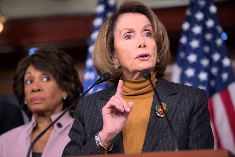 House Minority Leader Nancy Pelosi of Calif., joined by Rep. Maxine Waters, D-Calif., criticizes President Trump's pro-Wall Street policies during a news conference. (AP Photo/J. Scott Applewhite)