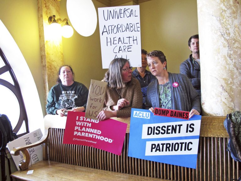 Lawmakers say the protesters at town halls are being paid by Democratic activists, so they're going virtual. (AP Photo/Matt Volz)