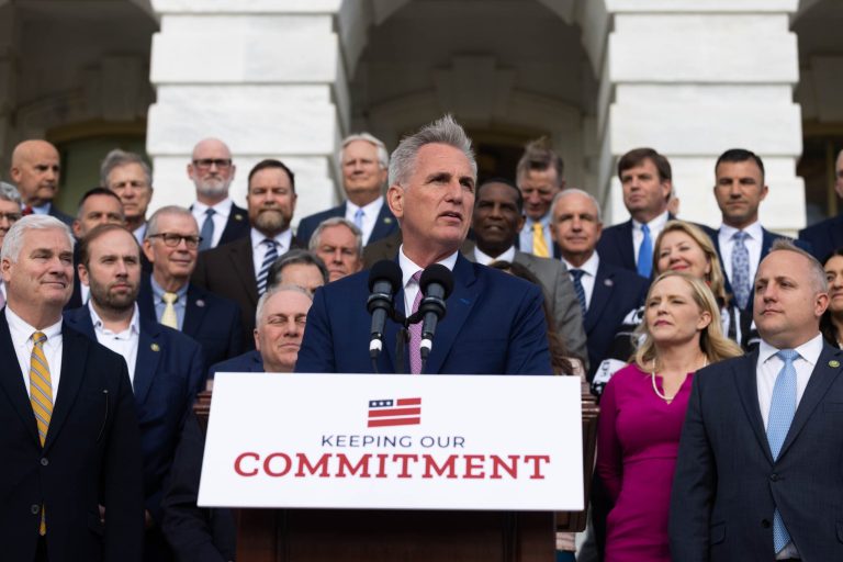 Speaker of the House Kevin McCarthy, R-Calif., joined by House Majority Leader Steve Scalise, R-La., holds an event to mark 100 days of the Republican majority in the House, at the Capitol in Washington, Monday, April 17, 2023. In a speech Monday at the New York Stock Exchange, the Republican leader accused President Joe Biden of refusing to engage in budget-cutting negotiations to prevent a debt crisis.