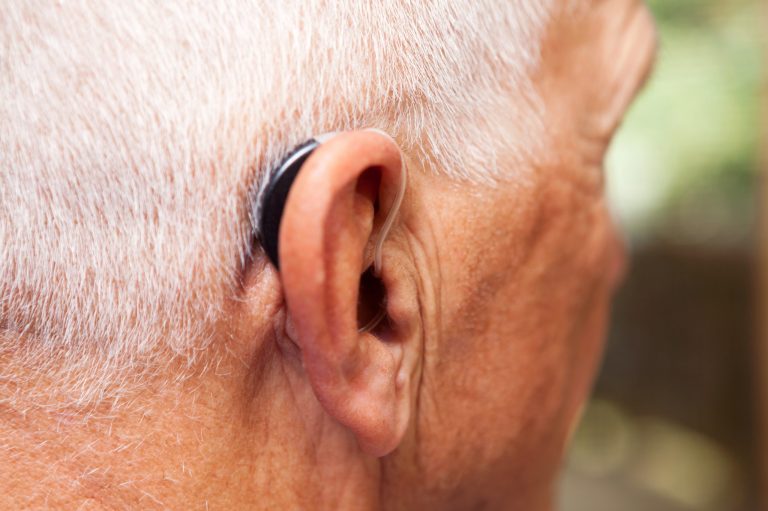 Many insurance plans don't cover traditional hearing aids, saddling consumers with thousands of dollars in out-of-pocket expenses. (iStock photo)