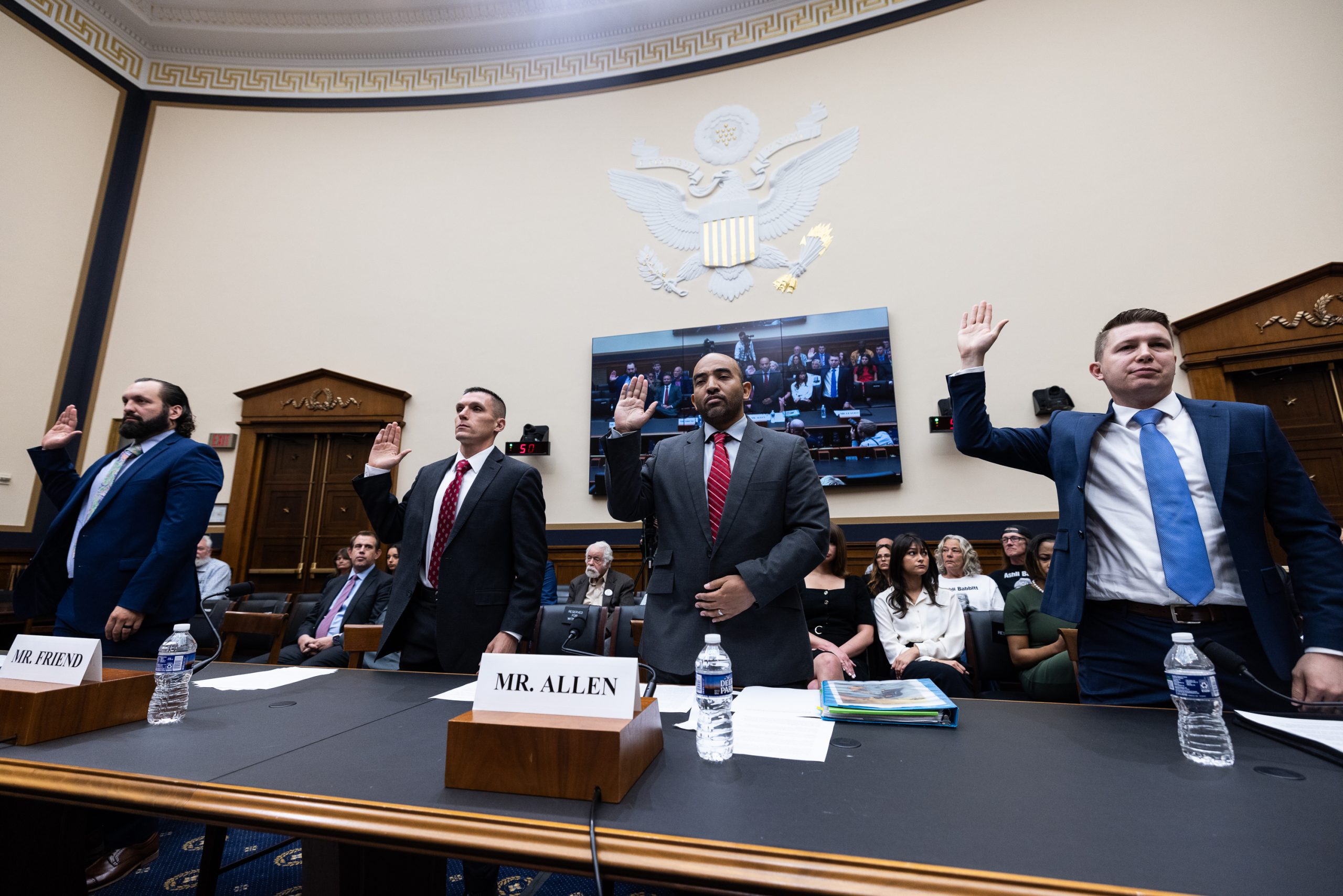 From Left: Suspended FBI special agent Garret O'Boyle, former FBI agent Steve Friend, suspended FBI agent Marcus Allen, and Empower Oversight President Tristan Leavitt are sworn in at the beginning of a House Select Subcommittee on the Weaponization of the Federal Government on Capitol Hill, on May 18, 2023, in Washington, DC.