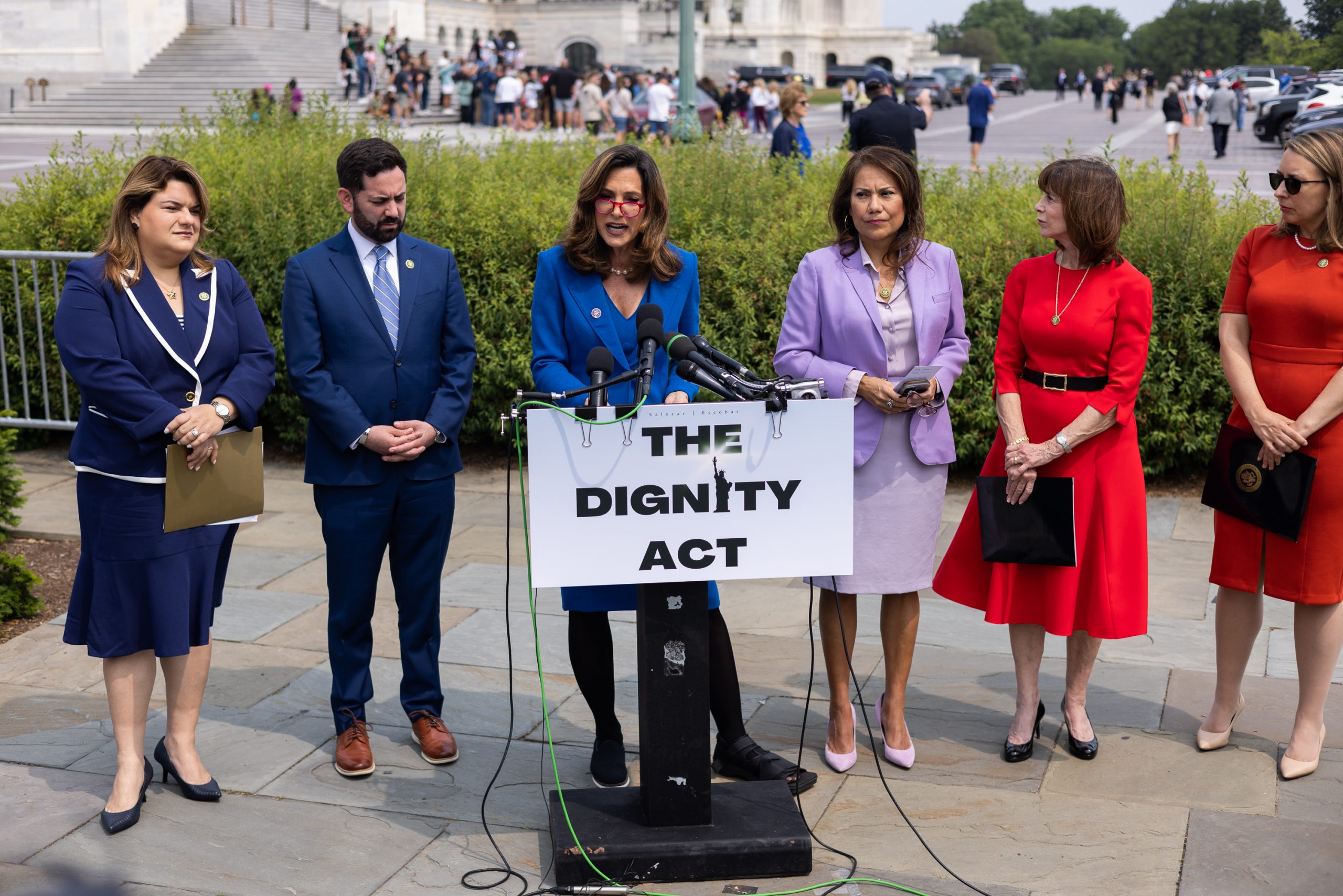Reps. María Elvira Salazar (R-FL), accompanied by a bipartisan group of lawmakers, speaks during a press conference on immigration and the "Dignity Act," which would offer a pathway to citizenship for undocumented immigrants in the U.S. while investing in border security. This bill follows the "Secure the Border Act" that passed the House on May 11, 2023, with no Democratic support.  The "Dignity Act" is co-sponsored by Rep. Veronica Escobar (D-TX).